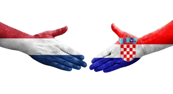 Händedruck Zwischen Kroatien Und Den Niederlanden Aufgemalte Hände Isoliertes Transparentes — Stockfoto