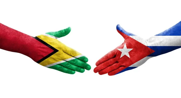 キューバとガイアナの旗の間に手で描かれた握手 孤立した透明なイメージ — ストック写真