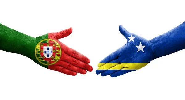 Händedruck Zwischen Curaçao Und Portugal Fahnen Auf Hände Gemalt Isoliertes — Stockfoto