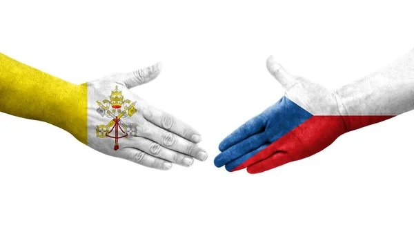 stock image Handshake between Czechia and Holy See flags painted on hands, isolated transparent image.