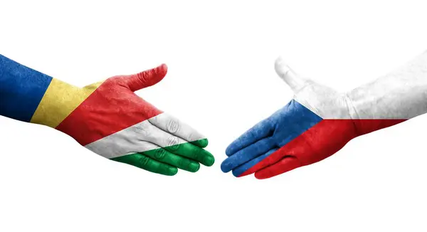 stock image Handshake between Czechia and Seychelles flags painted on hands, isolated transparent image.