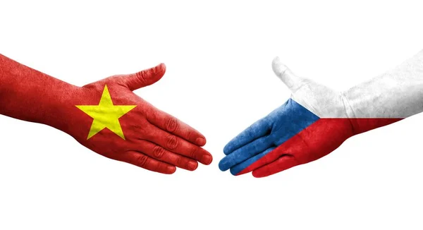 stock image Handshake between Czechia and Vietnam flags painted on hands, isolated transparent image.