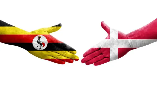 Apretón Manos Entre Dinamarca Uganda Banderas Pintadas Las Manos Imagen —  Fotos de Stock
