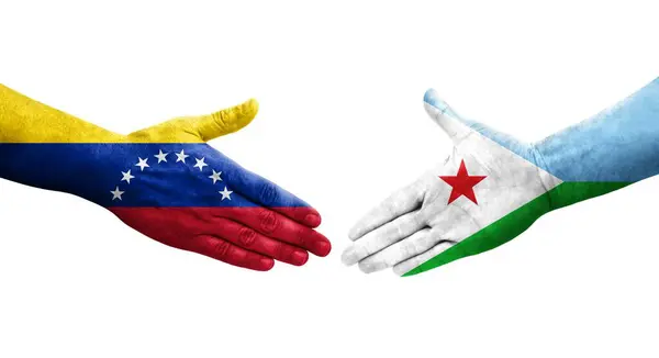 stock image Handshake between Djibouti and Venezuela flags painted on hands, isolated transparent image.