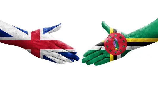 Apretón Manos Entre Dominica Gran Bretaña Banderas Pintadas Las Manos — Foto de Stock