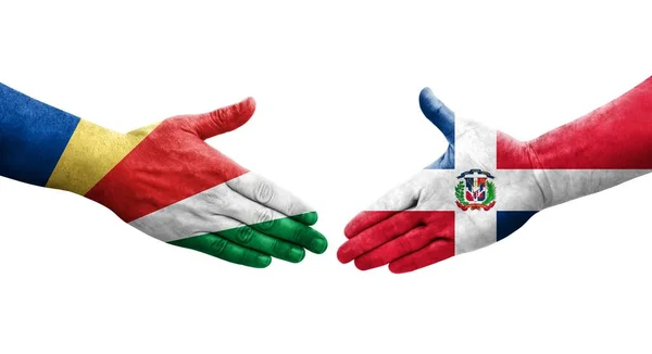 多米尼加共和国和塞舌尔的国旗之间的握手 孤立透明的图像 — 图库照片