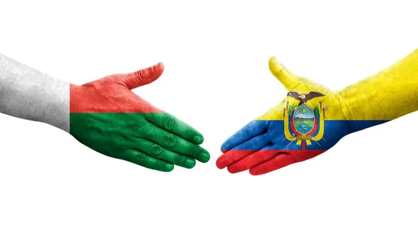Χειραψία Μεταξύ Εκουαδόρ Και Μαδαγασκάρης Σημαίες Ζωγραφισμένα Στα Χέρια Απομονωμένη — Φωτογραφία Αρχείου