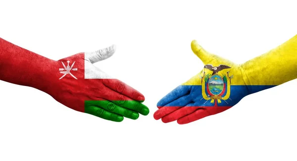 Χειραψία Μεταξύ Εκουαδόρ Και Ομάν Σημαίες Ζωγραφισμένα Στα Χέρια Απομονωμένη — Φωτογραφία Αρχείου