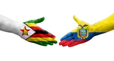 Ekvador ve Zimbabwe bayrakları arasındaki el sıkışma ellerinde izole şeffaf görüntü.