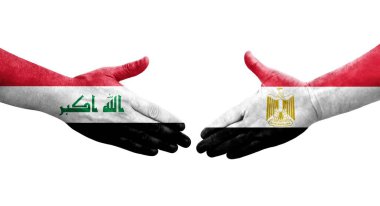 Mısır ve Irak bayrakları arasında el sıkışma, izole şeffaf görüntü.