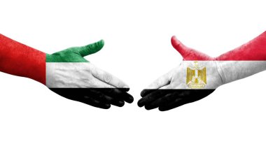 Mısır ve BAE bayrakları arasındaki el sıkışma, izole edilmiş şeffaf görüntü.
