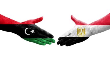 Mısır ve Libya bayrakları arasındaki el sıkışma el yazısı, izole edilmiş şeffaf görüntü.