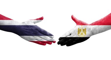 Mısır ve Tayland bayrakları arasında el sıkışma, izole şeffaf görüntü.
