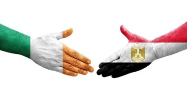 Mısır ve İrlanda bayrakları arasında el sıkışma, izole şeffaf görüntü.