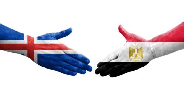 Mısır ve İzlanda bayrakları arasında el sıkışma, izole şeffaf görüntü.
