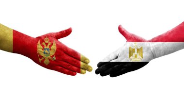 Mısır ve Karadağ bayrakları arasında el sıkışma, izole şeffaf görüntü.