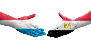 Mısır ve Lüksemburg bayrakları arasında el sıkışma, izole şeffaf görüntü.