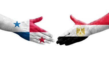 Mısır ve Panama bayrakları arasındaki el sıkışma elleri boyalı, izole şeffaf görüntü.