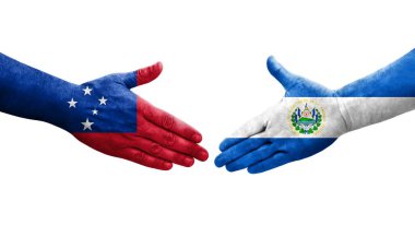 El Salvador ve Samoa bayrakları arasındaki el sıkışma ellerinde izole şeffaf görüntü.