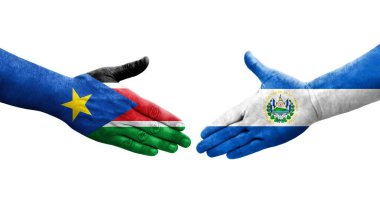 El Salvador ve Güney Sudan bayrakları arasındaki el sıkışma, izole şeffaf görüntü.