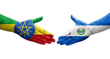 El Salvador ve Etiyopya bayrakları arasındaki el sıkışma ellerinde izole şeffaf görüntü.