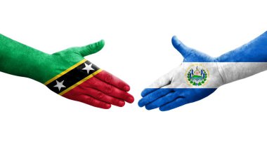 El Salvador ve Saint Kitts ve Nevis bayrakları arasındaki el sıkışma..