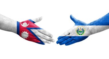 El Salvador ve Nepal bayrakları arasındaki tokalaşma elleri boyalı, izole şeffaf görüntü.