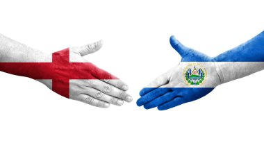 El Salvador ve İngiltere bayrakları arasındaki el sıkışma ellerinde resmedilmiş şeffaf görüntü.
