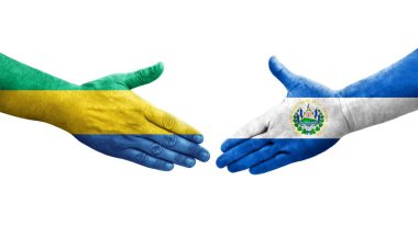 El Salvador ve Gabon bayrakları arasındaki tokalaşma ellerinde izole şeffaf görüntü.