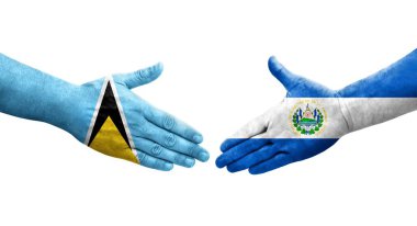 El Salvador ve Saint Lucia bayrakları arasındaki el sıkışma..