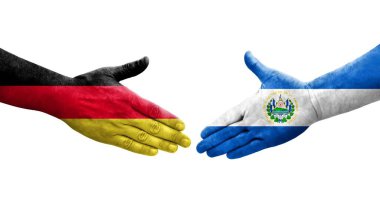 El Salvador ve Almanya arasındaki el sıkışma ellerinde bayraklar, izole şeffaf görüntü.