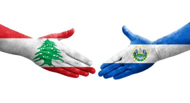 El Salvador ve Lübnan bayrakları arasındaki tokalaşma ellerinde izole şeffaf görüntü.