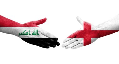 İngiltere ve Irak bayrakları arasında el sıkışma, izole şeffaf görüntü.