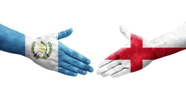 İngiltere ve Guatemala bayrakları arasındaki el sıkışma ellerinde resmedilmiş şeffaf görüntü.