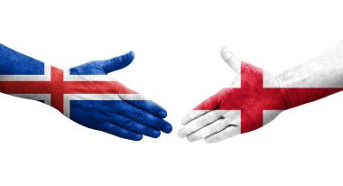 İngiltere ve İzlanda bayrakları arasında el sıkışma, izole edilmiş şeffaf görüntü.