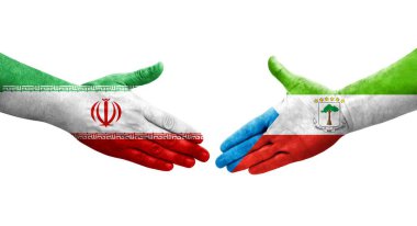 Ekvator Ginesi ve İran bayrakları arasındaki el sıkışma, izole şeffaf görüntü.