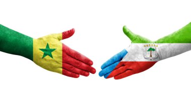 Ekvator Ginesi ve Senegal bayrakları arasındaki el sıkışma, izole şeffaf görüntü.