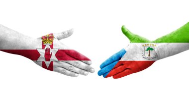 Ekvator Ginesi ile Kuzey İrlanda bayrakları arasındaki el sıkışma, izole şeffaf görüntü.