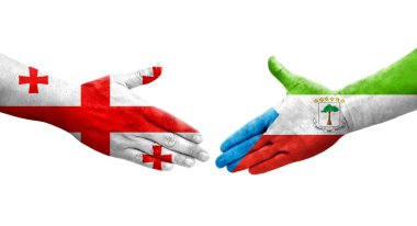 Ekvator Ginesi ve Gürcistan bayrakları arasındaki el sıkışma, izole şeffaf görüntü.