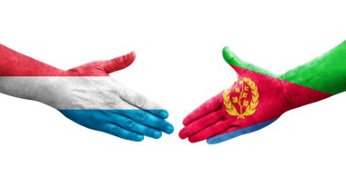 Eritre ve Lüksemburg bayrakları arasındaki el sıkışma, izole şeffaf görüntü.