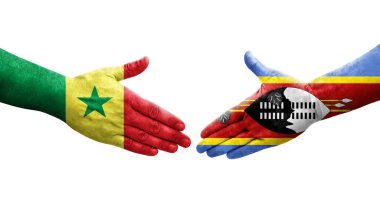 Ellerinde Eswatini ve Senegal bayrakları arasında el sıkışma, izole şeffaf görüntü.