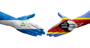 Ellerinde Eswatini ve Nikaragua bayrakları arasında el sıkışma, izole şeffaf görüntü.