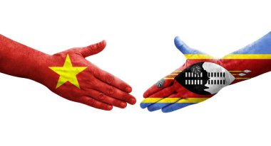 Eswatini ve Vietnam bayrakları arasındaki el sıkışma ellerinde resmedilmiş şeffaf görüntü.