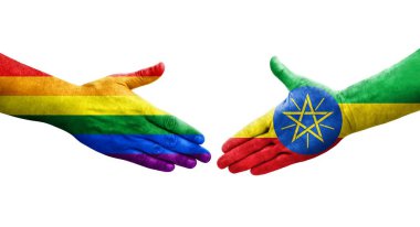 Etiyopya ve LGBT bayrakları arasında el sıkışma, izole şeffaf resim.