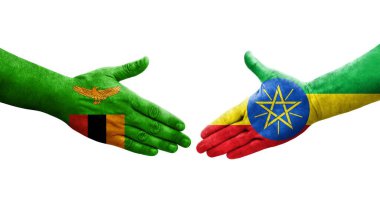 Etiyopya ve Zambiya bayrakları arasındaki el sıkışma ellere boyanmış, izole şeffaf görüntü.