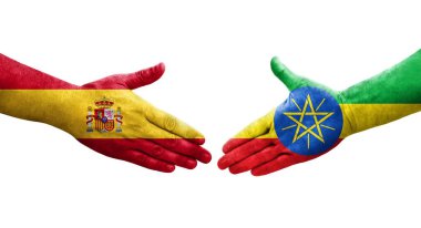 Etiyopya ve İspanya bayrakları arasındaki el sıkışma ellerinde resmedilmiş şeffaf görüntü.