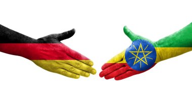 Etiyopya ve Almanya arasındaki el sıkışma ellerinde bayraklar, izole edilmiş şeffaf görüntü.
