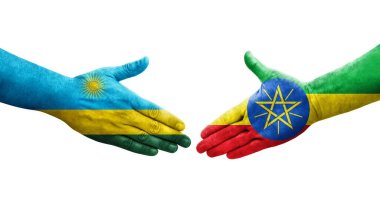 Etiyopya ve Ruanda bayrakları arasındaki el sıkışma ellerinde izole şeffaf görüntü.