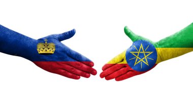 Etiyopya ve Lihtenştayn bayrakları arasındaki el sıkışma, izole şeffaf görüntü.