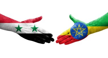 Etiyopya ve Suriye bayrakları arasında el sıkışma, izole şeffaf görüntü.